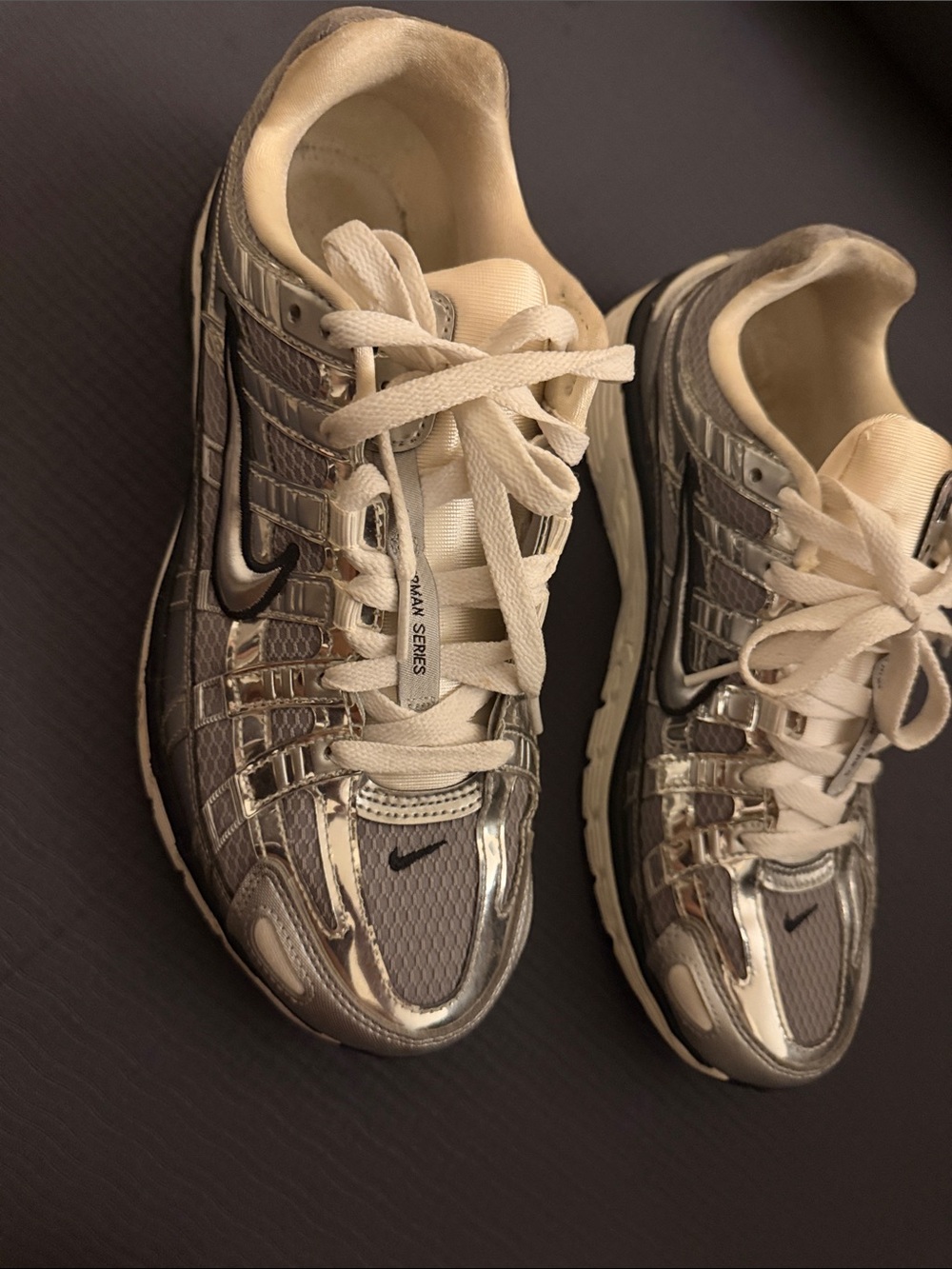 Nike Women’s Silver and White Reflective Mesh Sneakers